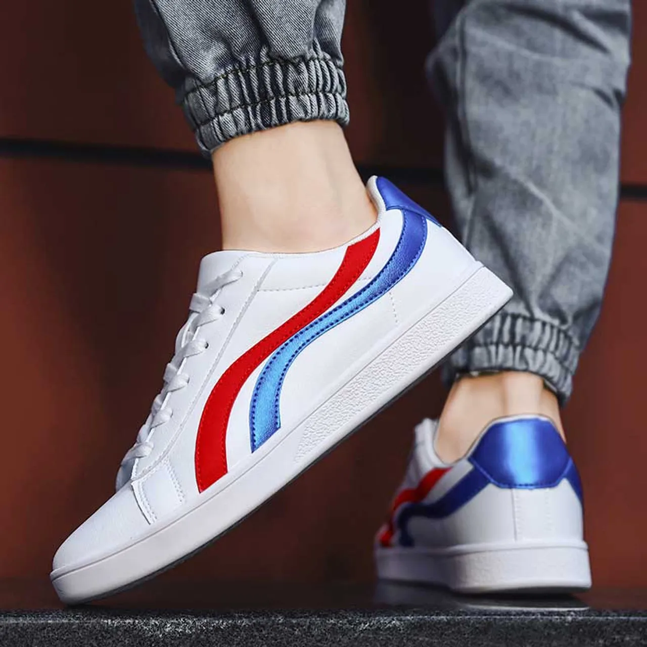 White blue curved stripe casual shoe sneaker