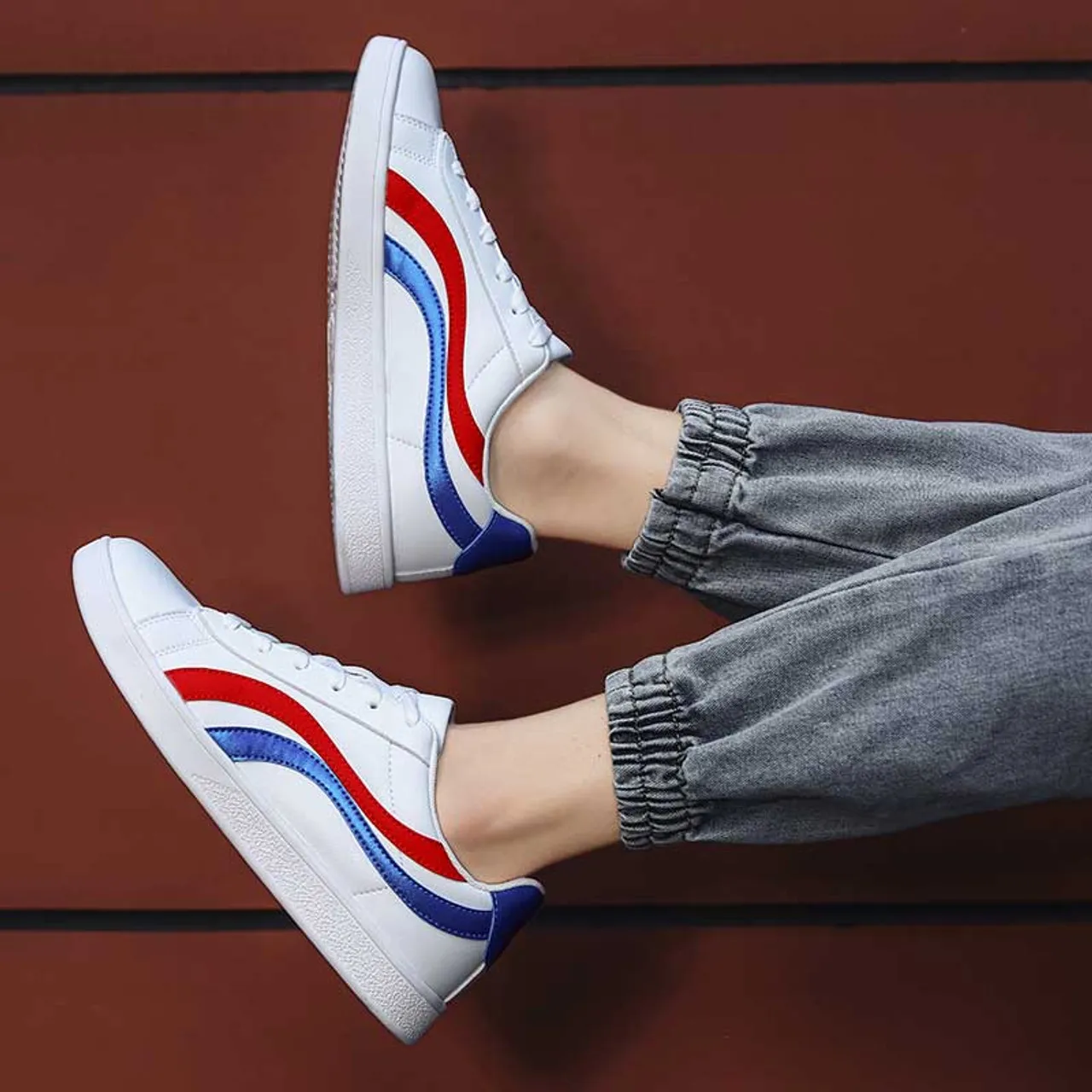 White blue curved stripe casual shoe sneaker